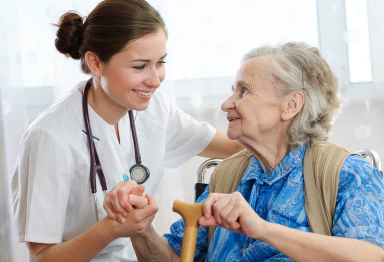 Senior woman with her in-home caregiver